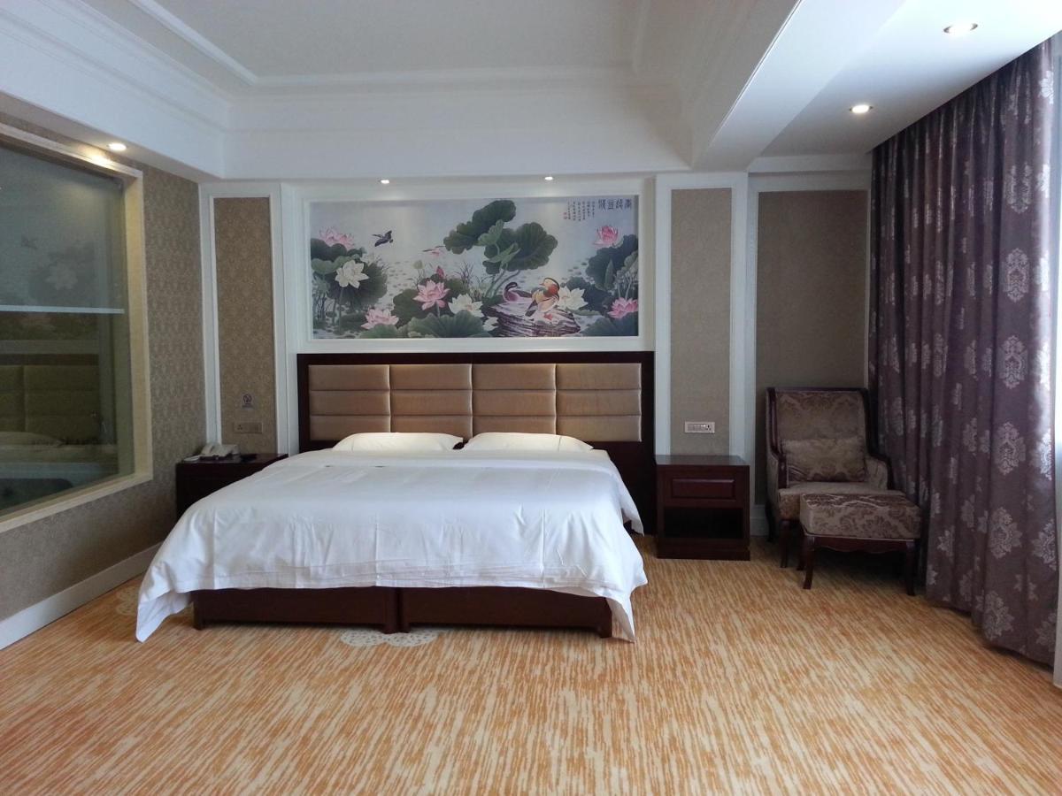 New West Street Hotel - Grand Wing Yangshuo Værelse billede